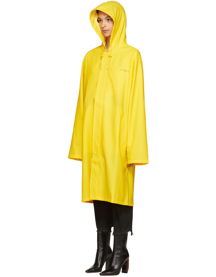 VETEMENTS Yellow Logo Raincoat · VERGLE
