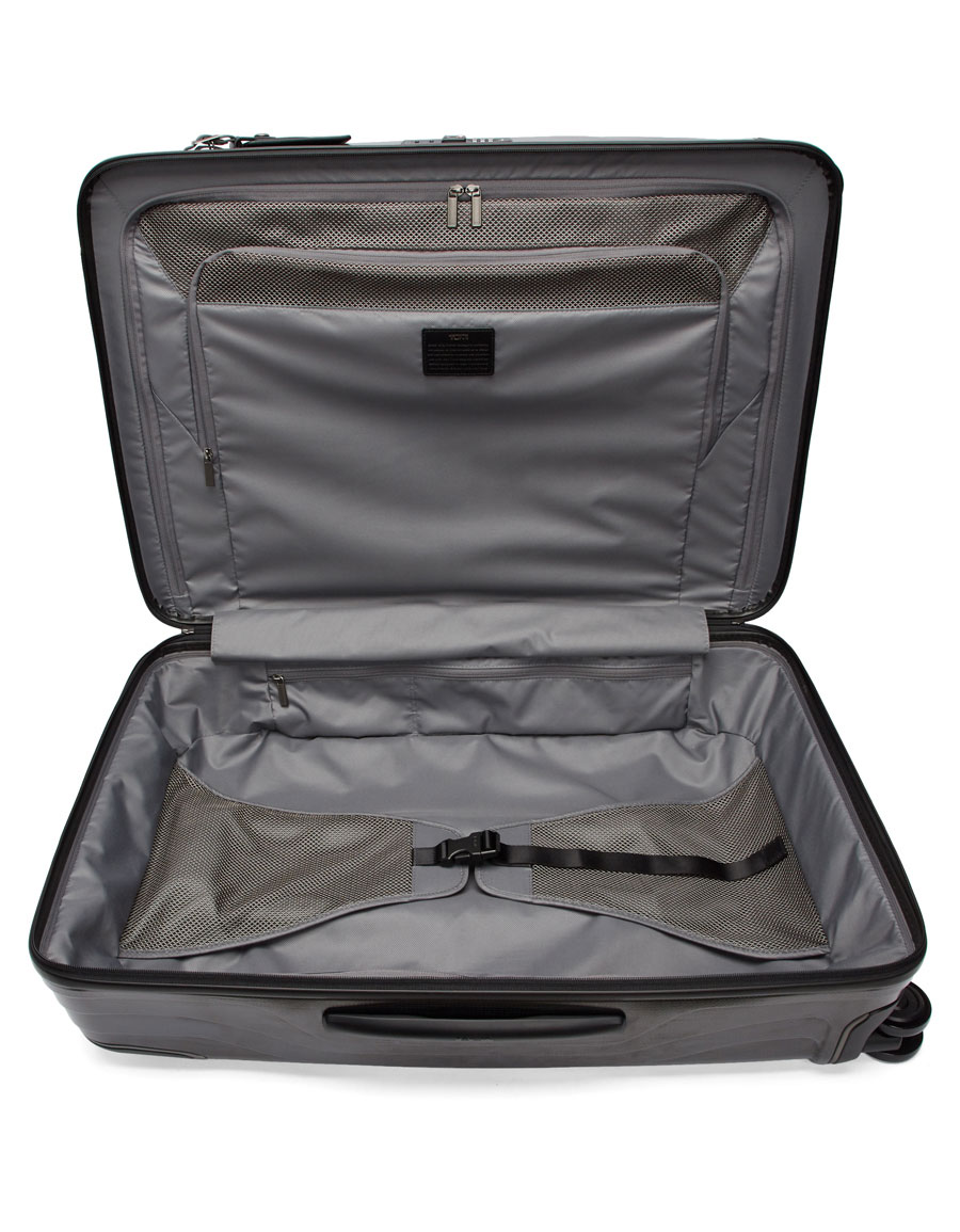 TUMI Black Extended Trip Suitcase · VERGLE